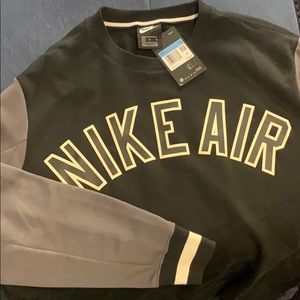 Nike sweater size M. Brand new with tags. No flaws